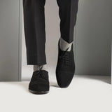 Styled On-Foot Perspective Demonstrating Ankle Fit & Silhouette on Model