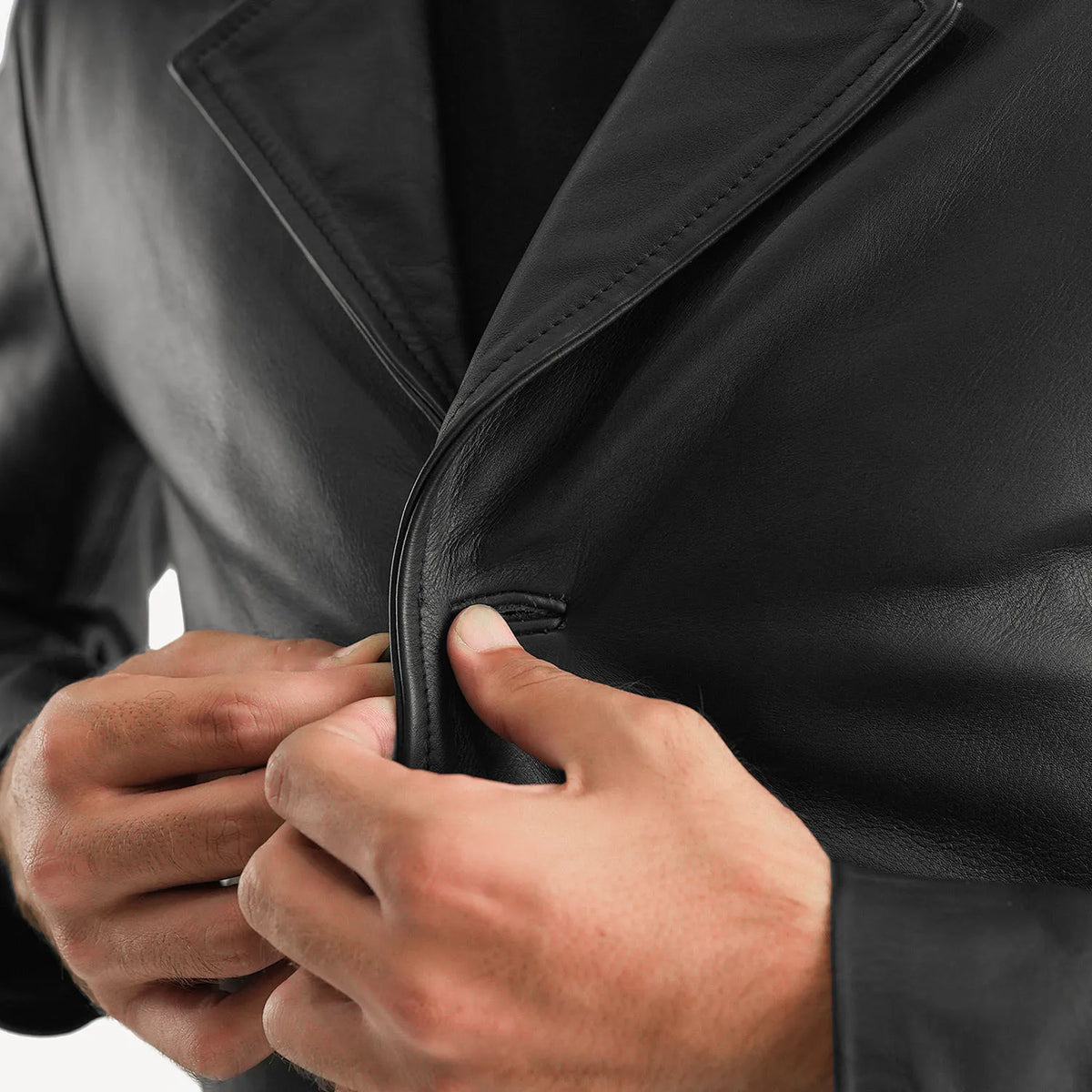 Close-Up Detail of Notch & Button Hardware on Men's Classmith Black Leather Coat
