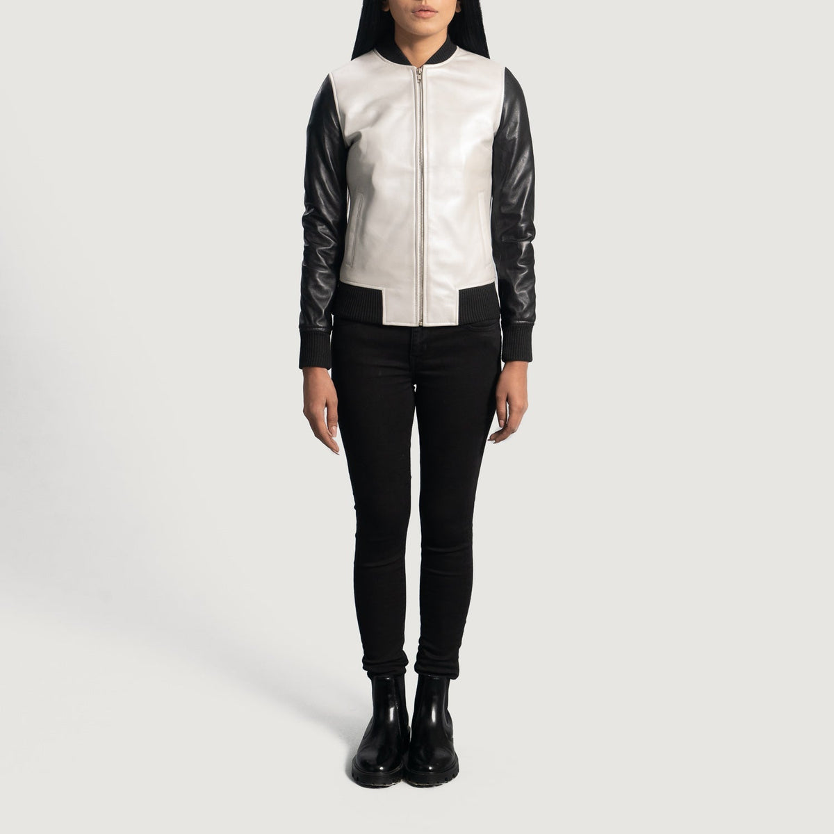 Close-Up Detail of Varsity & Zipper Hardware on Women's Cole Silver Leather Bomber Jacket
