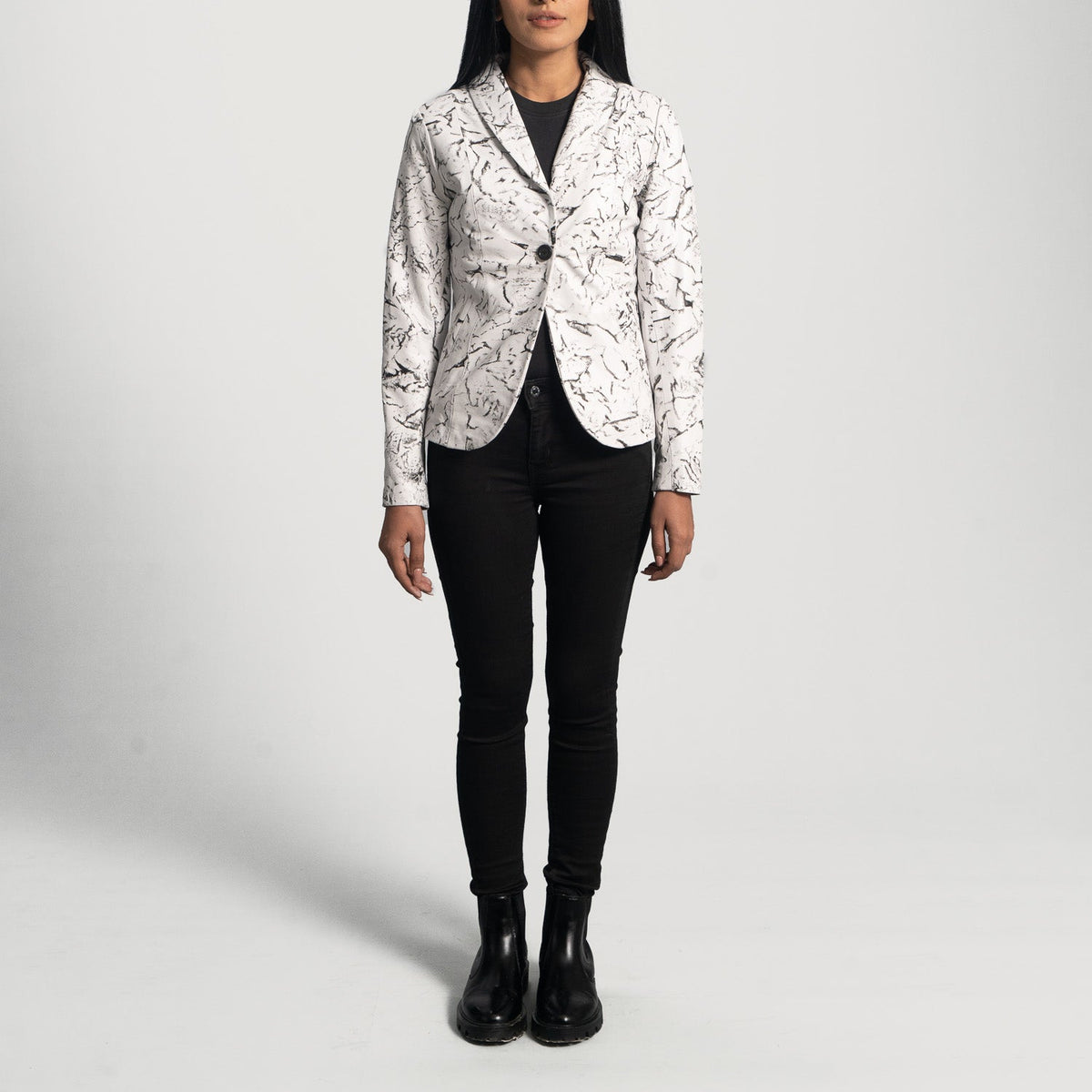Close-Up Detail of Notch & Button Hardware on Women's Donna Blake White Leather Blazer