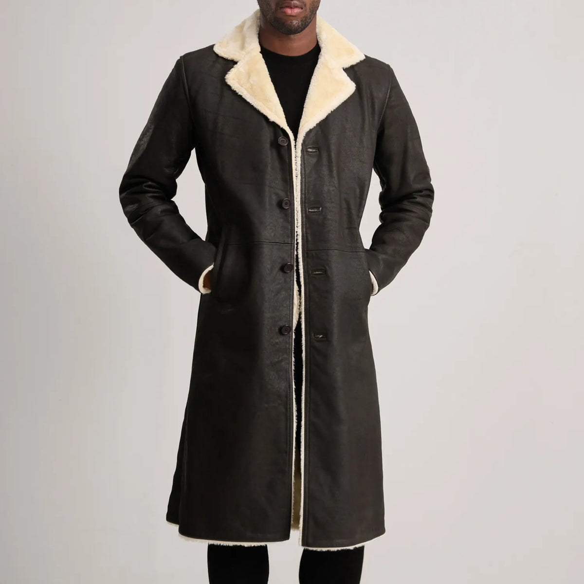 Close-Up Detail of Notch & Button Hardware on Kolby Tumbled Brown Shearling Long Coat