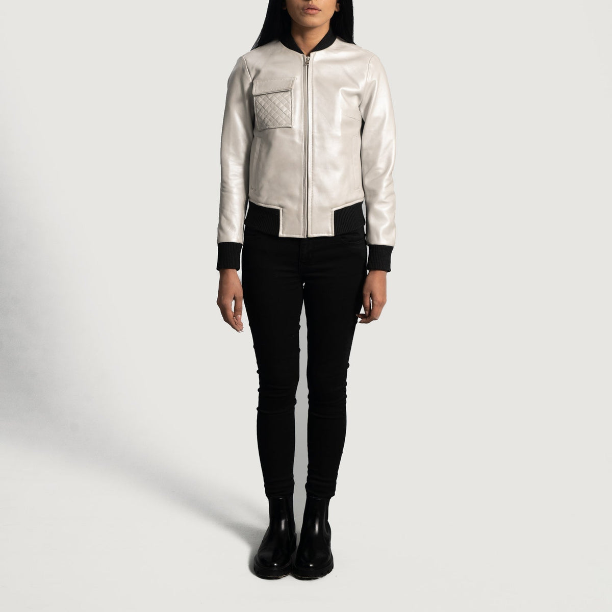 Close-Up Detail of Varsity & Zipper Hardware on Women's Lana Silver Leather Bomber Jacket