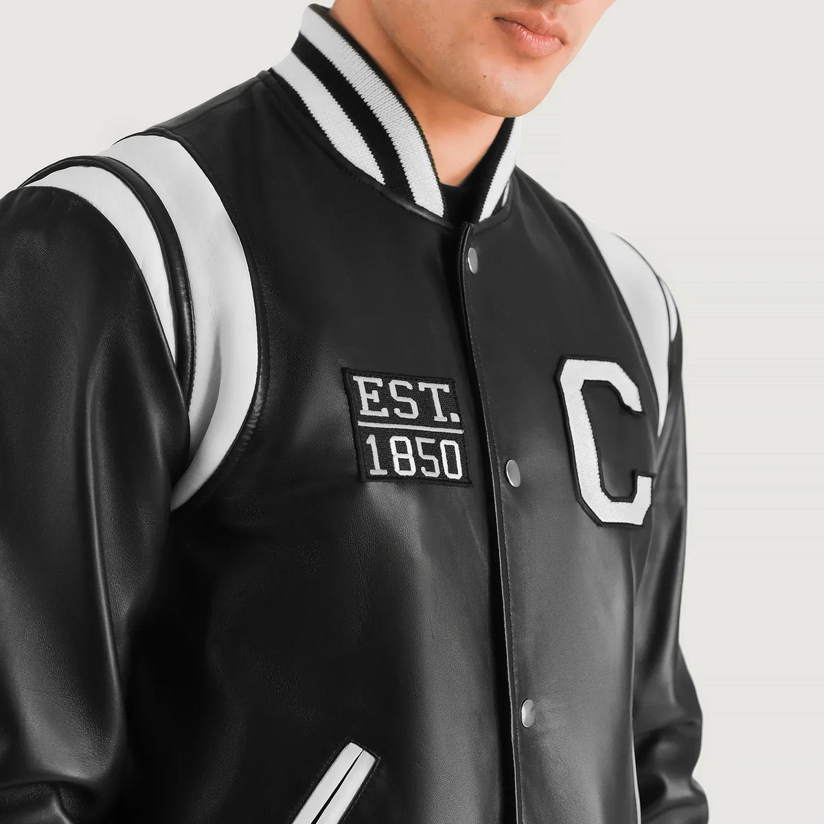 Close-Up Detail of Varsity & Snap Button Hardware on Liberte California Black Leather Varsity Jacket