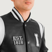 Close-Up Detail of Varsity & Snap Button Hardware on Liberte Illinois Black Leather Varsity Jacket