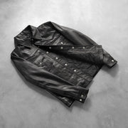 Button & Hem Craftsmanship Construction Detail on Men's Ranchson Black Leather Shirt