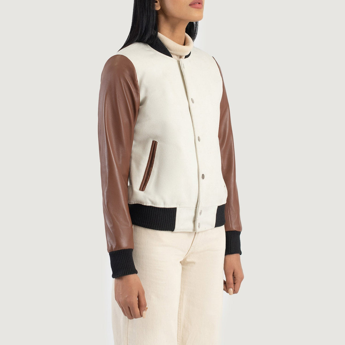 Styled Fit Perspective of Savant Green Hybrid Varsity Jacket on Model - Natural Daylight Drape