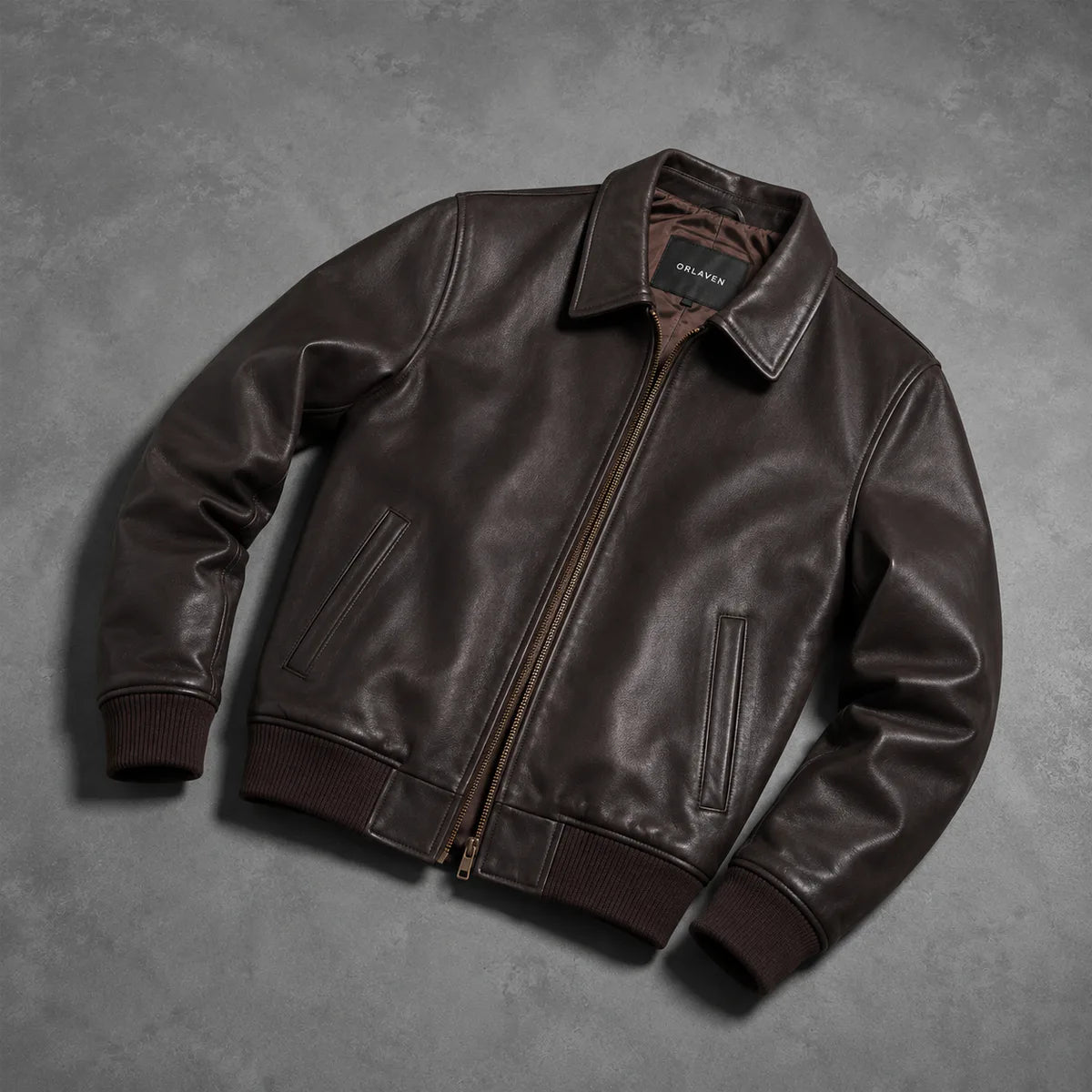 ORLAVEN dark brown leather bomber jacket – flat lay front