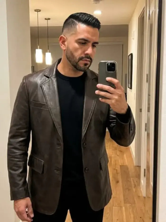 Verified client Oliver Finch (Edinburgh, UK) wearing the Orlaven Men’s Rub-Off Brown Leather Blazer in rub-off espresso brown tailored full-grain calfskin leather, displaying authentic leather patina and rugged asymmetrical moto styling.