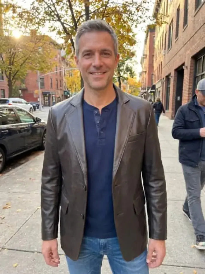 Verified client Mathias Weber (Berlin, DE) wearing the Orlaven Men’s Rub-Off Brown Leather Blazer in rub-off espresso brown tailored full-grain calfskin leather, styled with dark selvedge denim and Goodyear-welted boots in Berlin.
