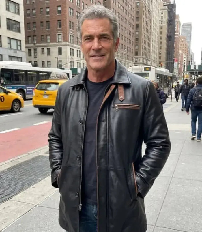 Verified client Liam O'Connor (Dublin, IE) wearing the Orlaven Men’s Black Leather Overcoat — Mid-Length Car Coat Style in deep onyx black tailored full-grain calfskin leather, featuring clean tailored shoulder drape and heavy brass hardware.
