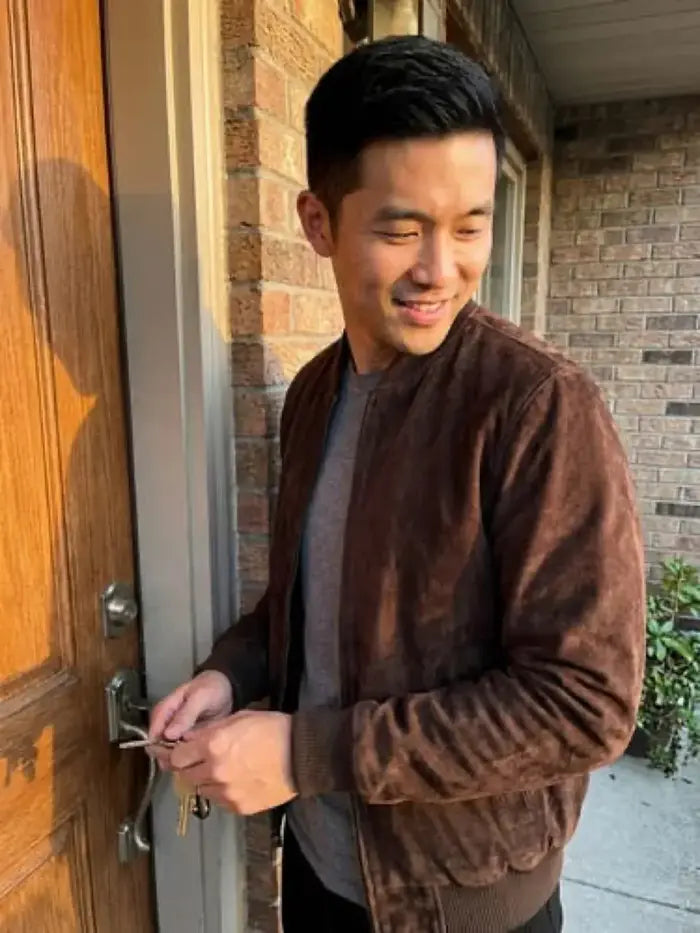 Verified client Tyler Reynolds (Portland, OR, US) wearing the Orlaven Men’s Dark Brown Suede Bomber Jacket in dark chocolate brown full-grain calfskin suede, layered effortlessly over an ivory cashmere knit for cold days in Portland, OR.